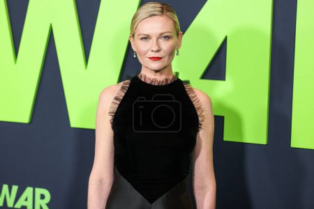 Photo for Kirsten Dunst arrives at the Los Angeles Special Screening Of A24's 'Civil War' held at the Academy Museum of Motion Pictures on April 2, 2024 in Los Angeles, California, United States. - Royalty Free Image