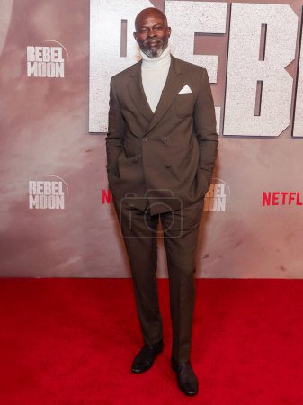 Photo for Djimon Hounsou arrives at Netflix's 'Rebel Moon - Part Two: The Scargiver' - 'Rebel Moon: Songs Of The Rebellion' Album Launch Event held at the Knockdown Center on April 3, 2024 in Queens, New York City, New York, United States. - Royalty Free Image