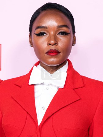 Photo for Janelle Monae (Janelle Mone) wearing a Sergio Hudson suit and jewelry by REZA arrives at the Fashion Trust U.S. Awards 2024 held at a Private Residence on April 9, 2024 in Beverly Hills, Los Angeles, California, United States. - Royalty Free Image