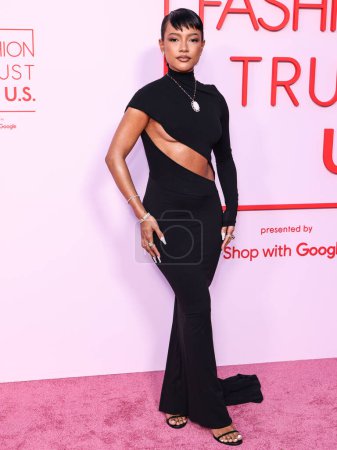 Foto de Karrueche Tran vistiendo un vestido de LaQuan Smith llega al Fashion Trust U.S. Premios 2024 celebrados en una Residencia Privada el 9 de abril de 2024 en Beverly Hills, Los Ángeles, California, Estados Unidos. - Imagen libre de derechos