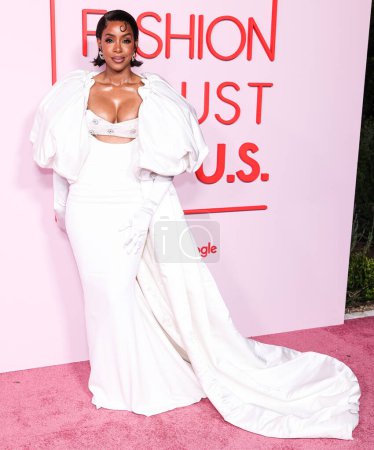 Foto de Kelly Rowland vistiendo un vestido de Harbison Studio llega al Fashion Trust U.S. Premios 2024 celebrados en una Residencia Privada el 9 de abril de 2024 en Beverly Hills, Los Ángeles, California, Estados Unidos. - Imagen libre de derechos