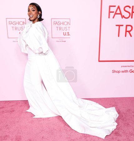 Téléchargez les photos : Kelly Rowland portant une robe Harbison Studio arrive au Fashion Trust U.S. Prix 2024 dans une résidence privée le 9 avril 2024 à Beverly Hills, Los Angeles, Californie, États-Unis. - en image libre de droit