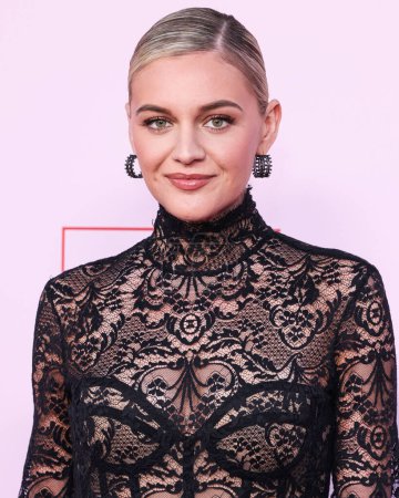 Photo for Kelsea Ballerini wearing a Zuhair Murad dress arrives at the Fashion Trust U.S. Awards 2024 held at a Private Residence on April 9, 2024 in Beverly Hills, Los Angeles, California, United States. - Royalty Free Image