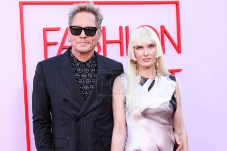 Photo for Matt Sorum and Ace Harper arrive at the Fashion Trust U.S. Awards 2024 held at a Private Residence on April 9, 2024 in Beverly Hills, Los Angeles, California, United States. - Royalty Free Image