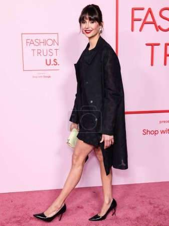 Photo for Nina Dobrev wearing a Tory Burch outfit arrives at the Fashion Trust U.S. Awards 2024 held at a Private Residence on April 9, 2024 in Beverly Hills, Los Angeles, California, United States. - Royalty Free Image