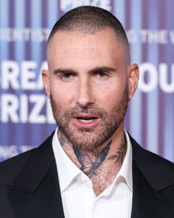 Photo for Adam Levine arrives at the 10th Annual Breakthrough Prize Ceremony held at the Academy Museum of Motion Pictures on April 13, 2024 in Los Angeles, California, United States. - Royalty Free Image