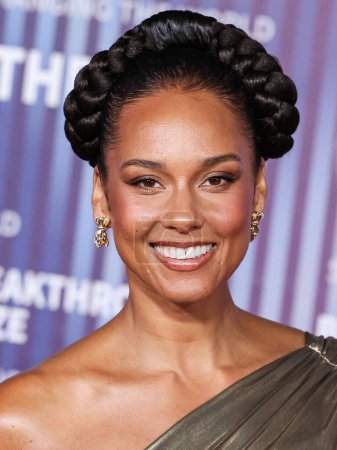 Photo for Alicia Keys arrives at the 10th Annual Breakthrough Prize Ceremony held at the Academy Museum of Motion Pictures on April 13, 2024 in Los Angeles, California, United States. - Royalty Free Image