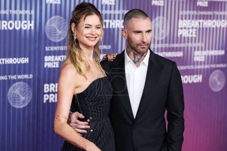 Photo for Behati Prinsloo and husband Adam Levine arrive at the 10th Annual Breakthrough Prize Ceremony held at the Academy Museum of Motion Pictures on April 13, 2024 in Los Angeles, California, United States. - Royalty Free Image