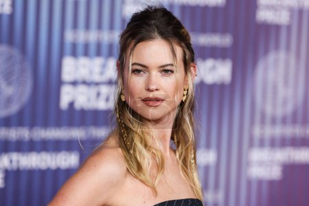 Photo for Behati Prinsloo wearing Jean Paul Gaultier SS95 RTW arrives at the 10th Annual Breakthrough Prize Ceremony held at the Academy Museum of Motion Pictures on April 13, 2024 in Los Angeles, California, United States. - Royalty Free Image