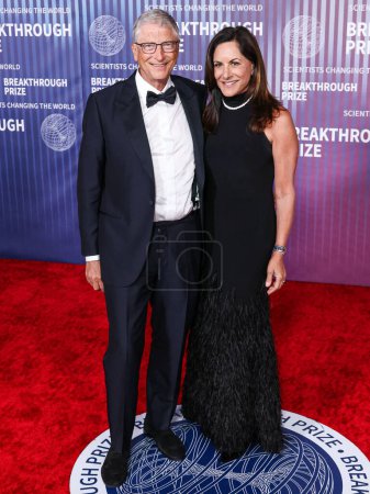 Photo for Bill Gates and girlfriend Paula Hurd arrive at the 10th Annual Breakthrough Prize Ceremony held at the Academy Museum of Motion Pictures on April 13, 2024 in Los Angeles, California, United States. - Royalty Free Image