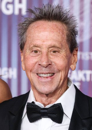 Photo for Brian Grazer arrives at the 10th Annual Breakthrough Prize Ceremony held at the Academy Museum of Motion Pictures on April 13, 2024 in Los Angeles, California, United States. - Royalty Free Image