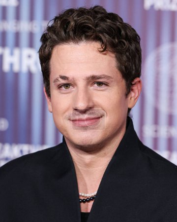 Photo for Charlie Puth arrives at the 10th Annual Breakthrough Prize Ceremony held at the Academy Museum of Motion Pictures on April 13, 2024 in Los Angeles, California, United States. - Royalty Free Image