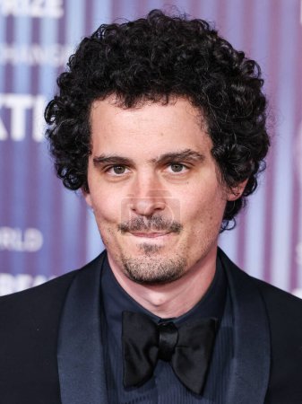 Photo for Damien Chazelle arrives at the 10th Annual Breakthrough Prize Ceremony held at the Academy Museum of Motion Pictures on April 13, 2024 in Los Angeles, California, United States. - Royalty Free Image