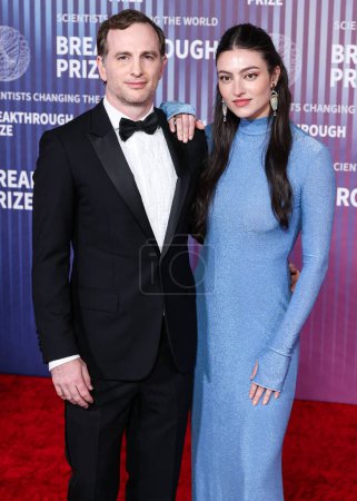 Photo for Joe Gebbia and Isabelle Boemeke arrive at the 10th Annual Breakthrough Prize Ceremony held at the Academy Museum of Motion Pictures on April 13, 2024 in Los Angeles, California, United States. - Royalty Free Image