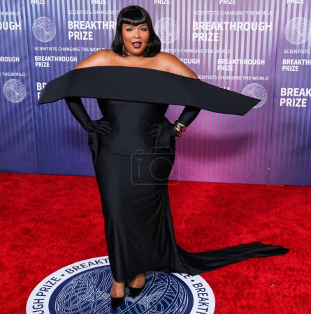 Photo for Lizzo wearing custom Quine Li arrives at the 10th Annual Breakthrough Prize Ceremony held at the Academy Museum of Motion Pictures on April 13, 2024 in Los Angeles, California, United States. - Royalty Free Image
