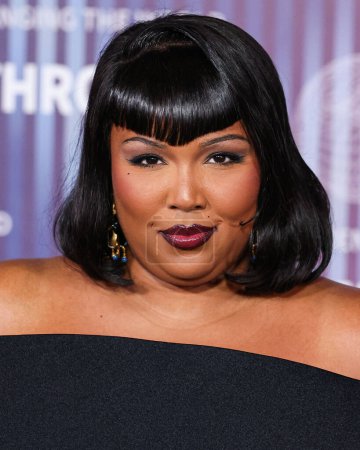 Photo for Lizzo wearing custom Quine Li arrives at the 10th Annual Breakthrough Prize Ceremony held at the Academy Museum of Motion Pictures on April 13, 2024 in Los Angeles, California, United States. - Royalty Free Image