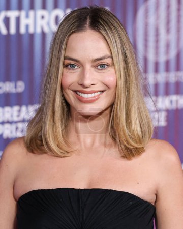 Photo for Margot Robbie wearing Rick Owens SS24 RTW and Jennifer Meyer jewels arrives at the 10th Annual Breakthrough Prize Ceremony held at the Academy Museum of Motion Pictures on April 13, 2024 in Los Angeles, California, United States. - Royalty Free Image