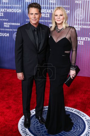 Photo for Rob Lowe and wife Sheryl Berkoff arrive at the 10th Annual Breakthrough Prize Ceremony held at the Academy Museum of Motion Pictures on April 13, 2024 in Los Angeles, California, United States - Royalty Free Image