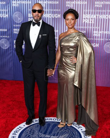 Photo for Swizz Beatz and wife Alicia Keys arrive at the 10th Annual Breakthrough Prize Ceremony held at the Academy Museum of Motion Pictures on April 13, 2024 in Los Angeles, California, United States. ( - Royalty Free Image