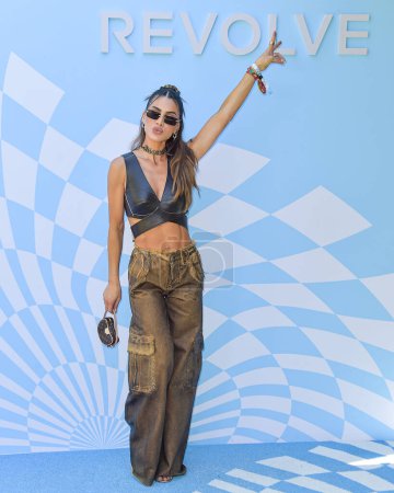 Photo for Camila Coelho arrives at the 7th Annual REVOLVE Festival 2024 during the 2024 Coachella Valley Music And Arts Festival - Weekend 1 - Day 2 held at the Parker Palm Springs Hotel on April 13, 2024 in Palm Springs, Riverside County, California, USA. - Royalty Free Image