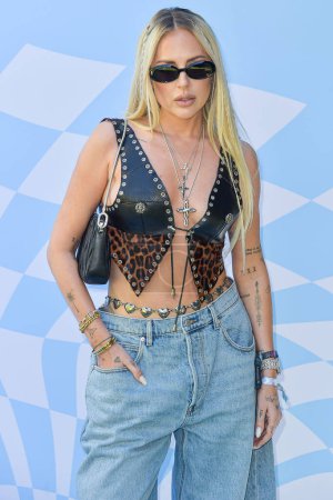 Photo for Maeve Reilly arrives at the 7th Annual REVOLVE Festival 2024 during the 2024 Coachella Valley Music And Arts Festival - Weekend 1 - Day 2 held at the Parker Palm Springs Hotel on April 13, 2024 in Palm Springs, Riverside County, California - Royalty Free Image