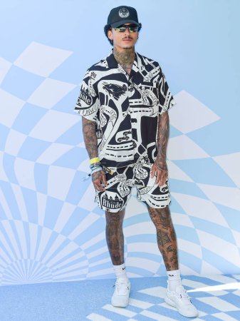 Photo for Nyjah Huston arrives at the 7th Annual REVOLVE Festival 2024 during the 2024 Coachella Valley Music And Arts Festival - Weekend 1 - Day 2 held at the Parker Palm Springs Hotel on April 13, 2024 in Palm Springs, Riverside County, California - Royalty Free Image