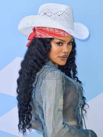 Photo for Teyana Taylor arrives at the 7th Annual REVOLVE Festival 2024 during the 2024 Coachella Valley Music And Arts Festival - Weekend 1 - Day 2 held at the Parker Palm Springs Hotel on April 13, 2024 in Palm Springs, Riverside County, California - Royalty Free Image
