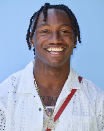 Photo for Zay Flowers arrives at the 7th Annual REVOLVE Festival 2024 during the 2024 Coachella Valley Music And Arts Festival - Weekend 1 - Day 2 held at the Parker Palm Springs Hotel on April 13, 2024 in Palm Springs, Riverside County, California - Royalty Free Image
