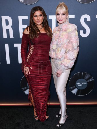 Photo for Nelly Furtado and Lucy Boynton arrive at the Los Angeles Premiere Of Searchlight Pictures' 'The Greatest Hits' held at the El Capitan Theatre on April 15, 2024 in Hollywood, Los Angeles, California, United States. - Royalty Free Image
