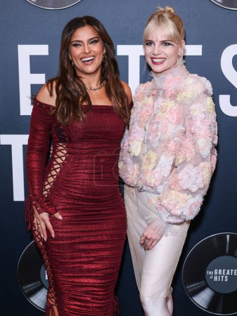 Photo for Nelly Furtado and Lucy Boynton arrive at the Los Angeles Premiere Of Searchlight Pictures' 'The Greatest Hits' held at the El Capitan Theatre on April 15, 2024 in Hollywood, Los Angeles, California, United States. - Royalty Free Image