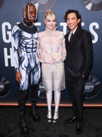 Photo for Austin Crute, Lucy Boynton and Justin H. Min arrive at the Los Angeles Premiere Of Searchlight Pictures' 'The Greatest Hits' held at the El Capitan Theatre on April 15, 2024 in Hollywood, Los Angeles, California, United States. - Royalty Free Image