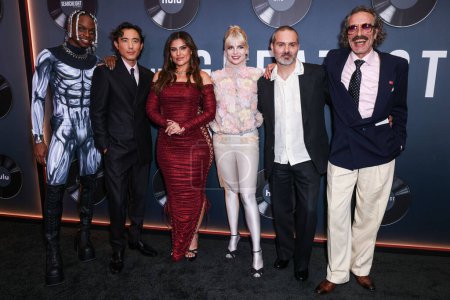 Photo for Austin Crute, Justin H. Min, Nelly Furtado, Lucy Boynton, Ned Benson and DJ Harvey arrive at the Los Angeles Premiere Of Searchlight Pictures' 'The Greatest Hits' held at the El Capitan Theatre on April 15, 2024 in Hollywood, Los Angeles, USA. - Royalty Free Image