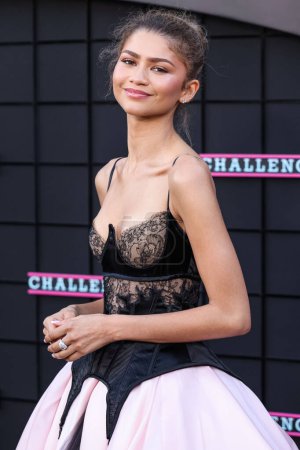 Photo for LOS ANGELES, CALIFORNIA, USA - APRIL 16: American actress and singer Zendaya wearing a custom Vera Wang dress and Bulgari jewelry arrives at Premiere Of Amazon MGM Studios' 'Challengers' held at Westwood Village Theater - Royalty Free Image