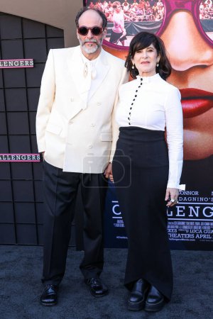 Photo for Luca Guadagnino and Amy Pascal arrive at the Los Angeles Premiere Of Amazon MGM Studios' 'Challengers' held at Westwood Village Theater on April 16, 2024 in Westwood, Los Angeles, California, United States. - Royalty Free Image
