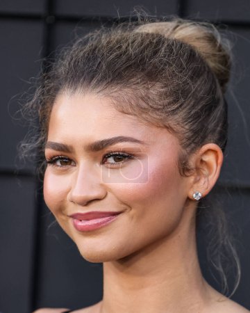 Photo for LOS ANGELES, CALIFORNIA, USA - APRIL 16: American actress and singer Zendaya wearing a custom Vera Wang dress and Bulgari jewelry arrives at Premiere Of Amazon MGM Studios' 'Challengers' held at Westwood Village Theater - Royalty Free Image