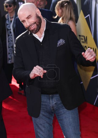 Photo for John Travolta arrives at the 15th Annual TCM Classic Film Festival 2024 Opening Night And 30th Anniversary Presentation Of Miramax's 'Pulp Fiction' held at the TCL Chinese Theatre on April 18, 2024 in Hollywood, Los Angeles, California, United States - Royalty Free Image
