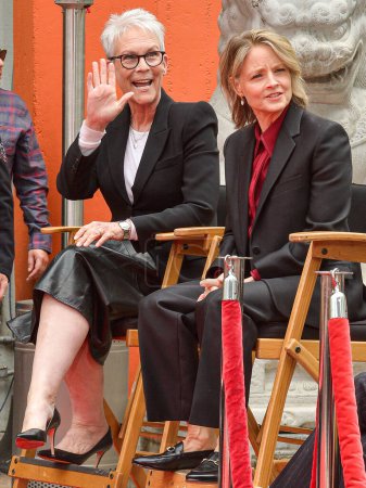 Photo for Jamie Lee Curtis and Jodie Foster attend the 15th Annual TCM Classic Film Festival 2024 - TCM Hosts Handprint And Footprint Ceremony Honoring Jodie Foster held at the TCL Chinese Theatre IMAX Forecourt on April 19, 2024 in Hollywood, Los Angeles, - Royalty Free Image