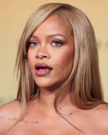 Photo for Rihanna (Robyn Rihanna Fenty) arrives at the Rihanna x Fenty Beauty New Product Launch For Fenty Beauty Soft'Lit Naturally Luminous Longwear Foundation held at 7th Street Studios on April 26, 2024 in Los Angeles, California, United States. - Royalty Free Image