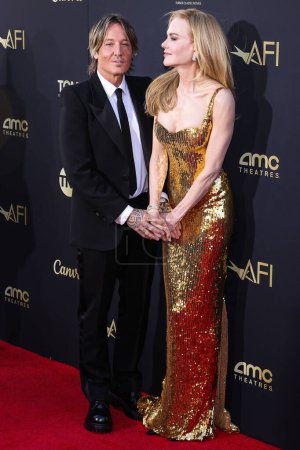 Photo for Keith Urban and wife Nicole Kidman arrive at 49th Annual AFI (American Film Institute) Lifetime Achievement Award Gala Tribute Celebrating Nicole Kidman held at Dolby Theatre on April 27, 2024 in Hollywood, Los Angeles, California, United States - Royalty Free Image