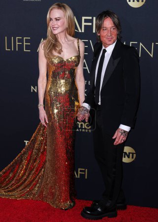Photo for Nicole Kidman and husband Keith Urban arrive at the 49th Annual AFI (American Film Institute) Lifetime Achievement Award Gala Tribute Celebrating Nicole Kidman held at the Dolby Theatre on April 27, 2024 in Hollywood, Los Angeles, California - Royalty Free Image