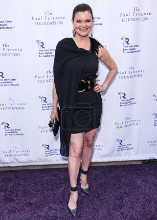 Photo for Heather Tom arrives at The John Ritter Foundation For Aortic Health's 'Evening From the Heart Gala' 2024 held at the Sunset Room Hollywood on May 9, 2024 in Hollywood, Los Angeles, California, United States - Royalty Free Image