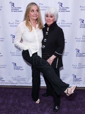 Photo for Priscilla Barnes and Joyce DeWitt arrive at The John Ritter Foundation For Aortic Health's 'Evening From the Heart Gala' 2024 held at the Sunset Room Hollywood on May 9, 2024 in Hollywood, Los Angeles, California, United States. - Royalty Free Image