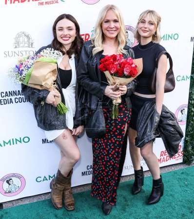 Photo for Natalie Alyn Lind, Barbara Alyn Woods and Alyvia Alyn Lind arrive at the Reefer Madness: The Musical' Opening Night Performance held at The Whitley on May 30, 2024 in Hollywood, Los Angeles, California, United States. - Royalty Free Image