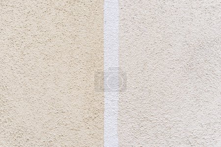 Foto de Detalle textura de la pared de hormigón - Fondo de patrón de superficie de estuco natural pintado en dos colores pastel - Imagen libre de derechos