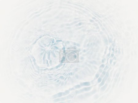 Defocus blurred transparent white colored clear calm water surface texture with splashes and bubbles. Trendy abstract nature background. Water waves in sunlight with copy space. White water shinning