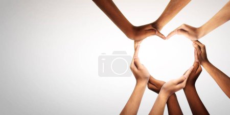 L'unité et la diversité sont au c?ur d'un groupe diversifié de personnes reliées entre elles comme un symbole de soutien qui représente un sentiment et une unité. Symbole et forme créés à partir des mains.
