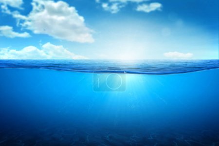 Photo for BLUE UNDER WATER waves and bubbles. Beautiful white clouds on blue sky over calm sea with sunlight reflection, Tranquil sea harmony of calm water surface. Sunny sky and calm blue ocean. - Royalty Free Image