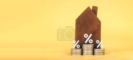 Foto de Mortgage rates business concept of investment housing real estate interest rates 3d home appraisal. planning savings money of coins to buy a home concept for property ladder, mortgage, real estate. - Imagen libre de derechos