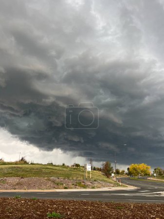 Photo for Storm clouds over Boulder Colorado are dumping massive amounts of hail as seen from Louisville Colorado - Royalty Free Image