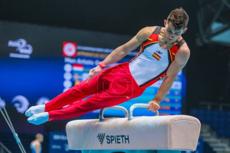 Photo for Szczecin, Poland, April 10, 2019:olympic athlete Mir Nicolau of Spain competes on the pommel horse during the European artistic gymnastics championships - Royalty Free Image